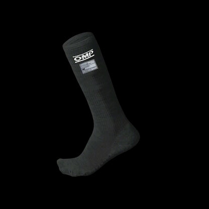OMP Black sock with a brand logo on a gray background